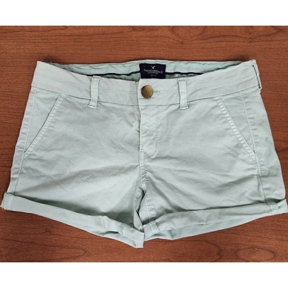 American Eagle Strech 4 mint green flat front shorts. Measures approx 30 waist,